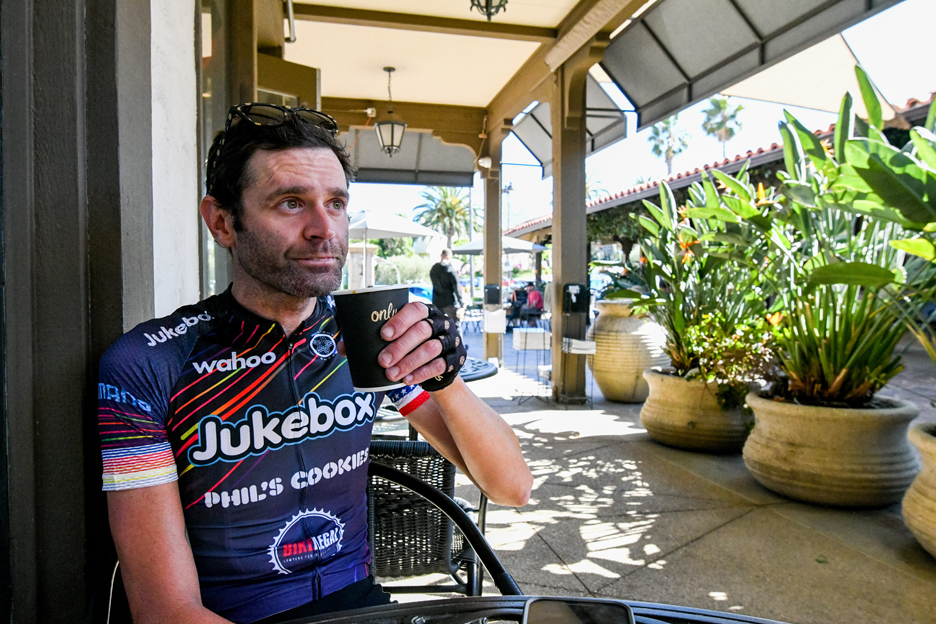 Phil Gaimon drinking a cup of coffee